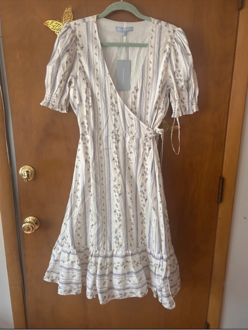 ANTONIO MELANI
White and Light Blue Floral
Wrap Midi Dress